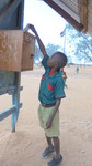 A student in Kenya uses a speak-out box